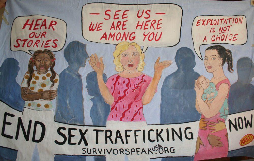 A mural painted with women and speech bubbles to raise awareness to end Sex Trafficking